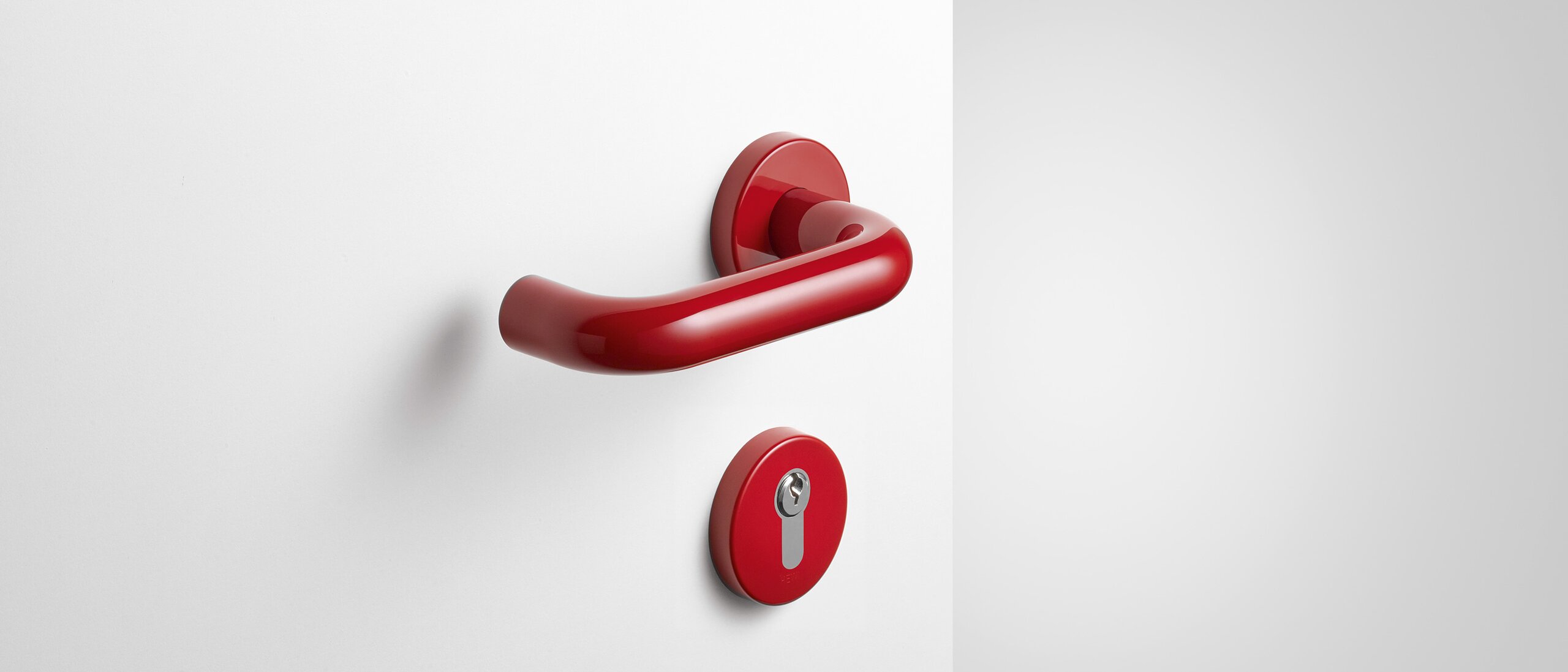 HEWI lever handle ruby red Lever handle with key rosette in the colour ruby red made of polyamide