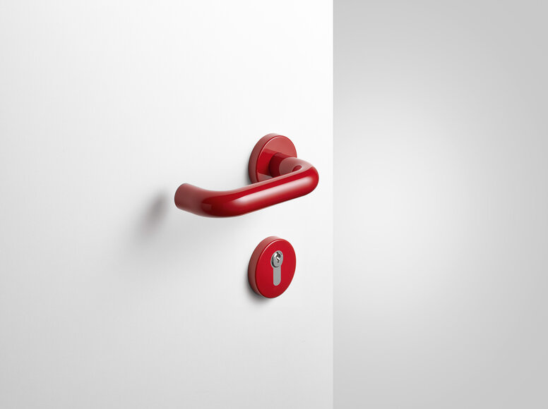 HEWI lever handle ruby red Lever handle with key rosette in the colour ruby red made of polyamide