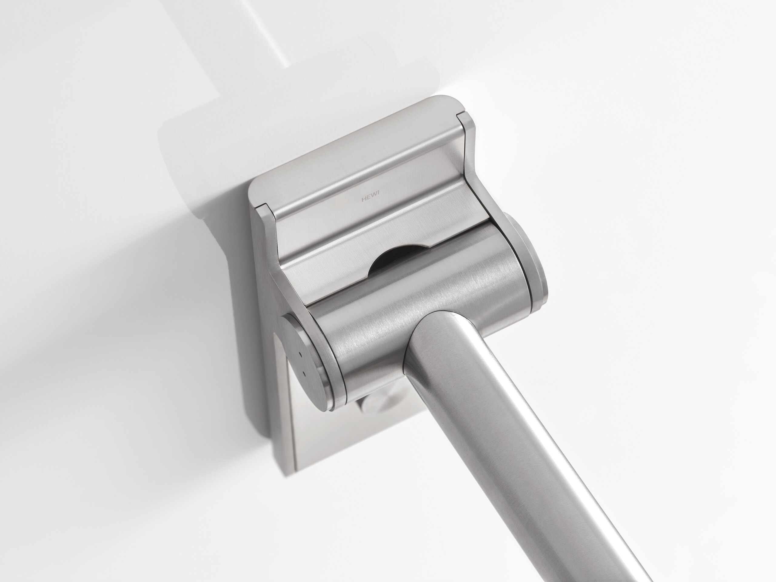 HEWI folding support handle in System 900 Hinged support rail