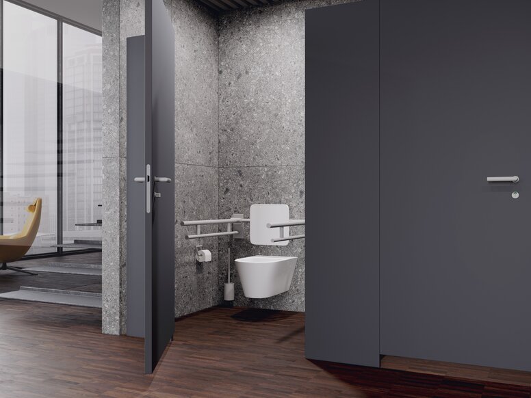 HEWI barrier-free public WC Public WC cubicle with back support and folding support handles in the colour signal white